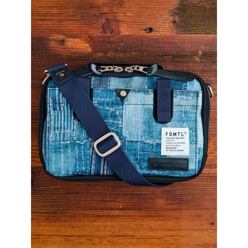 “Master-Piece x FDMTL” Compact Shoulder Bag in Boro